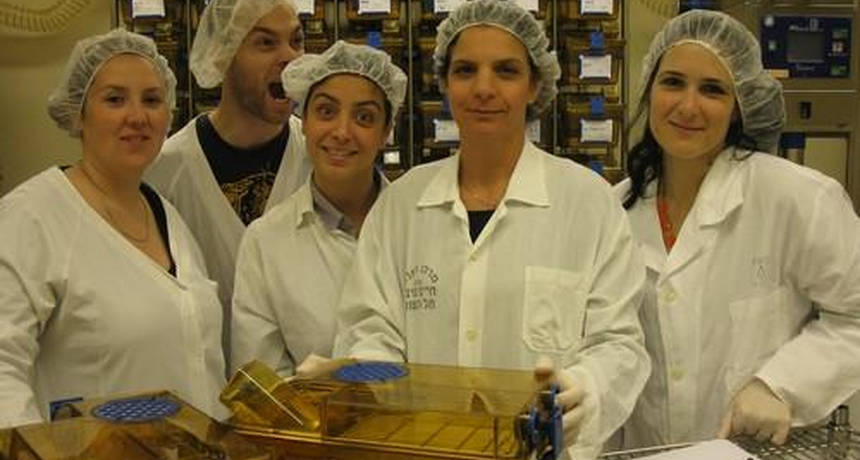 five personal staff next to a box