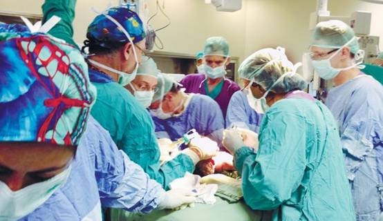 doctors in surgery room