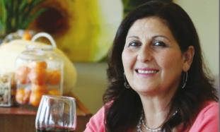 a woman holding a wine glass